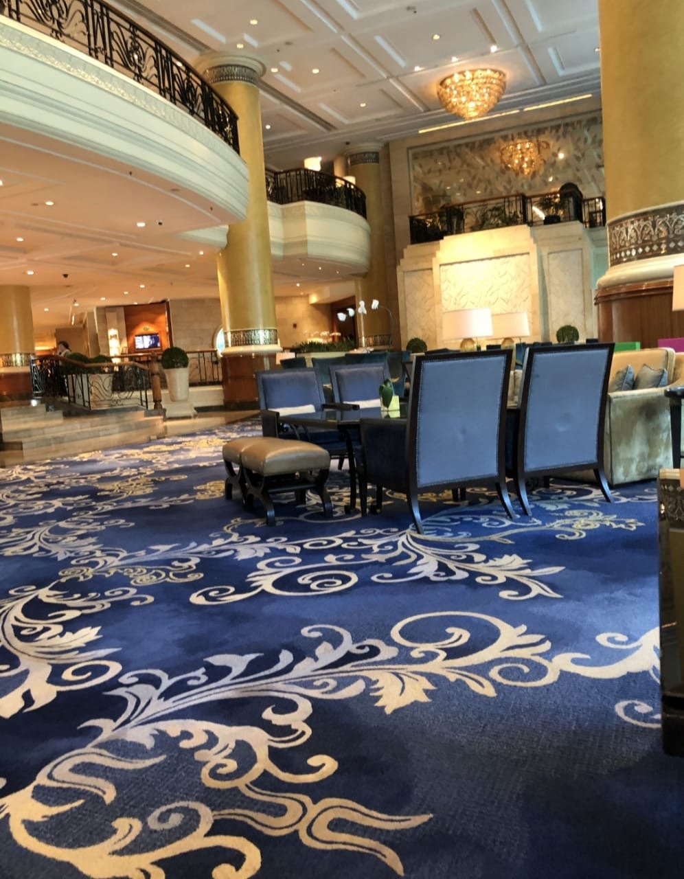 Hotel lobby blue luxury carpet installation in Udaipur – elegant hand-tufted rug for premium hospitality interiors